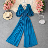 Eleganter V-Ausschnitt mit geradem Bein und weitem Bein, leichter Luxus-Overall mit rückenfreiem Mopping-Look, lässiger Jumpsuit